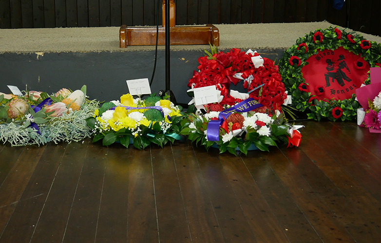 Wreaths laid at Harvey Town Hall.