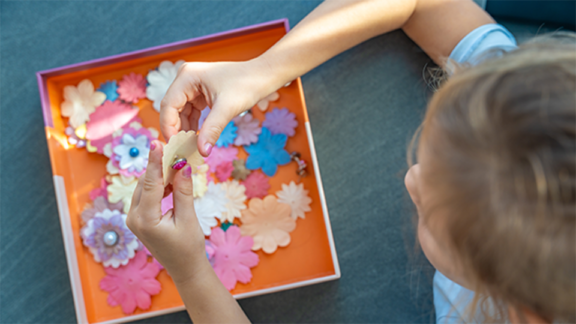 a child doing craft activities