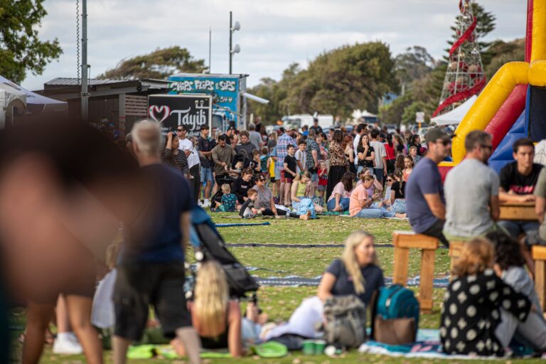 A crowd shot showing kids and their families having fun